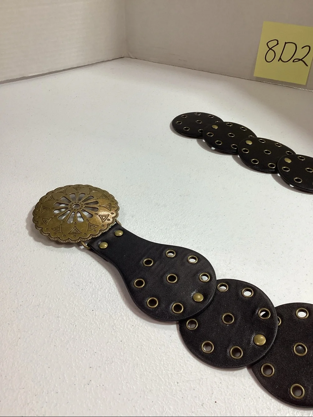 Women’s Black Leather Disc Belt with Brass Medallion